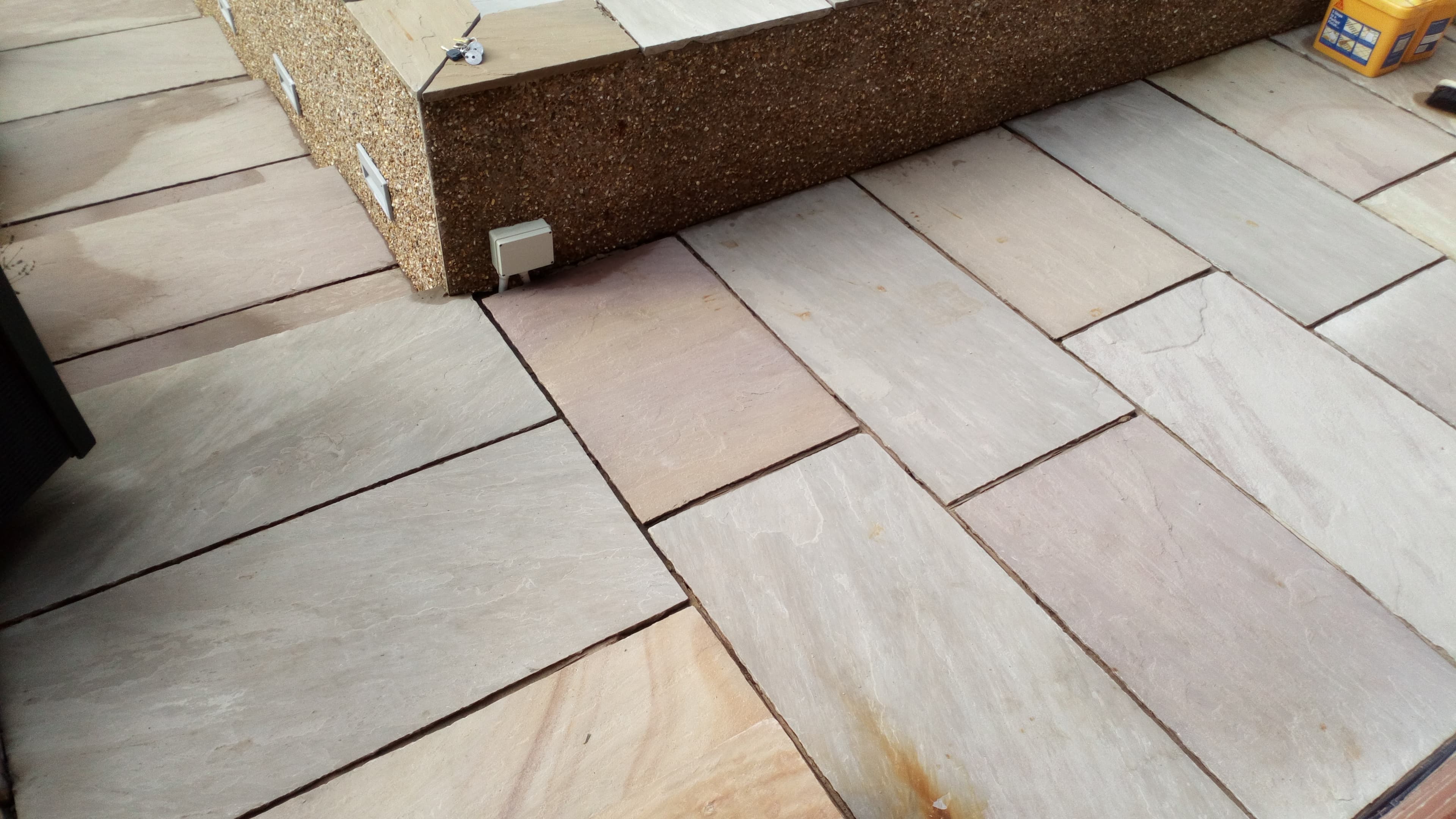 Riven Indian sandstone patio, mixed tones